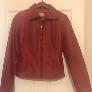 Red leather, zip jacket.  Genuine leather.